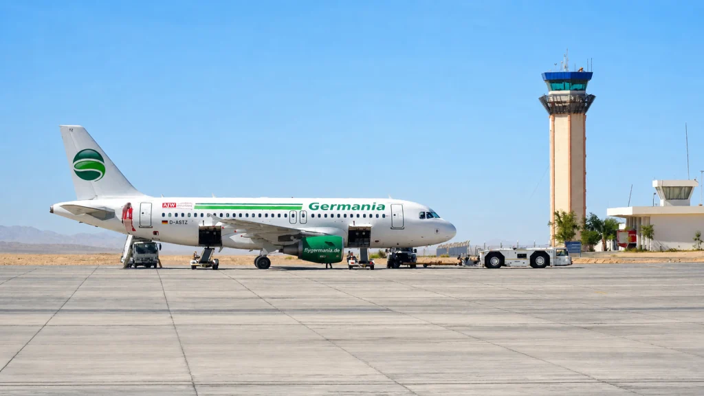 Aircraft and control tower at Marsa Alam International Airport