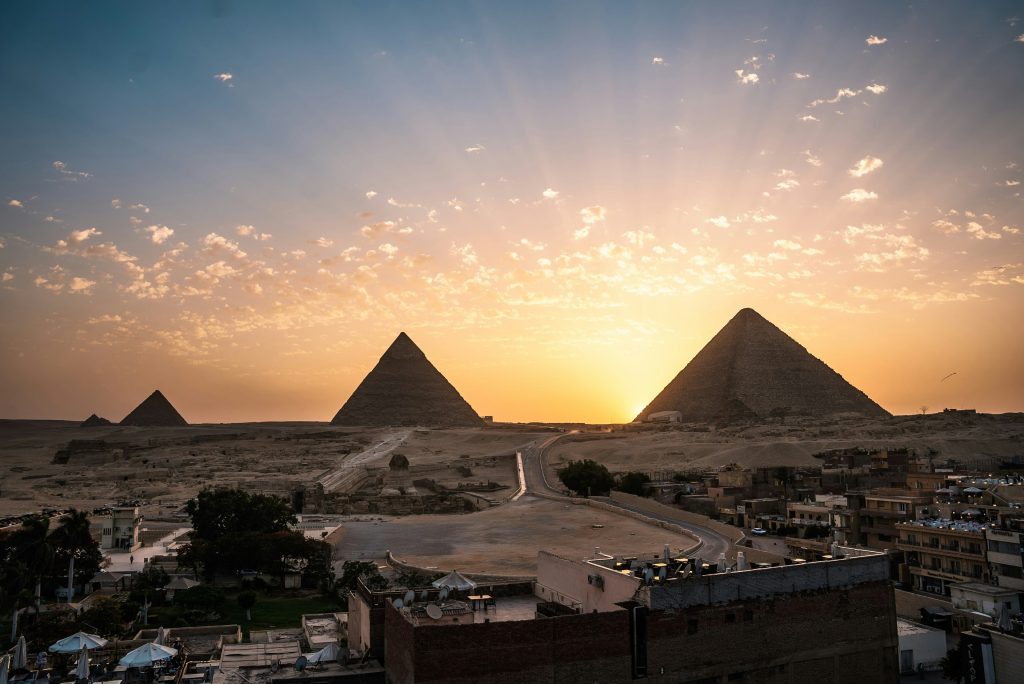 The Giza pyramid complex and Sphinx at sunset in Cairo