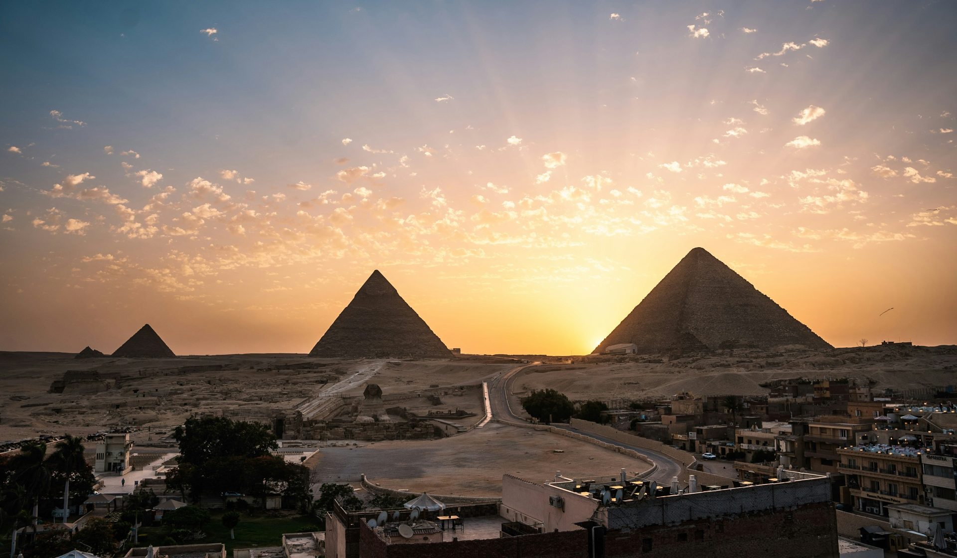 The Giza pyramid complex and Sphinx at sunset in Cairo