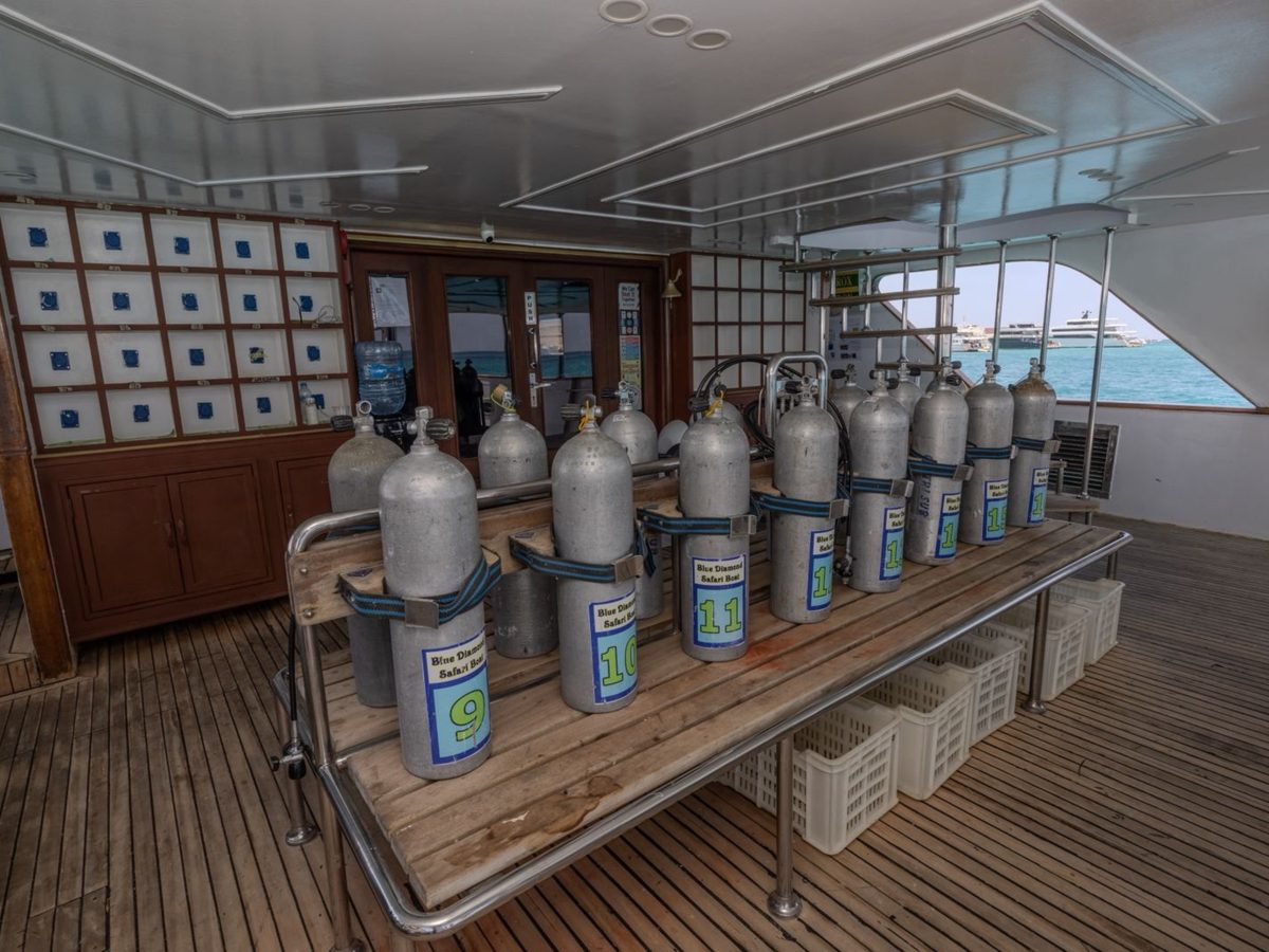 Organized scuba tanks on the liveaboard dive deck