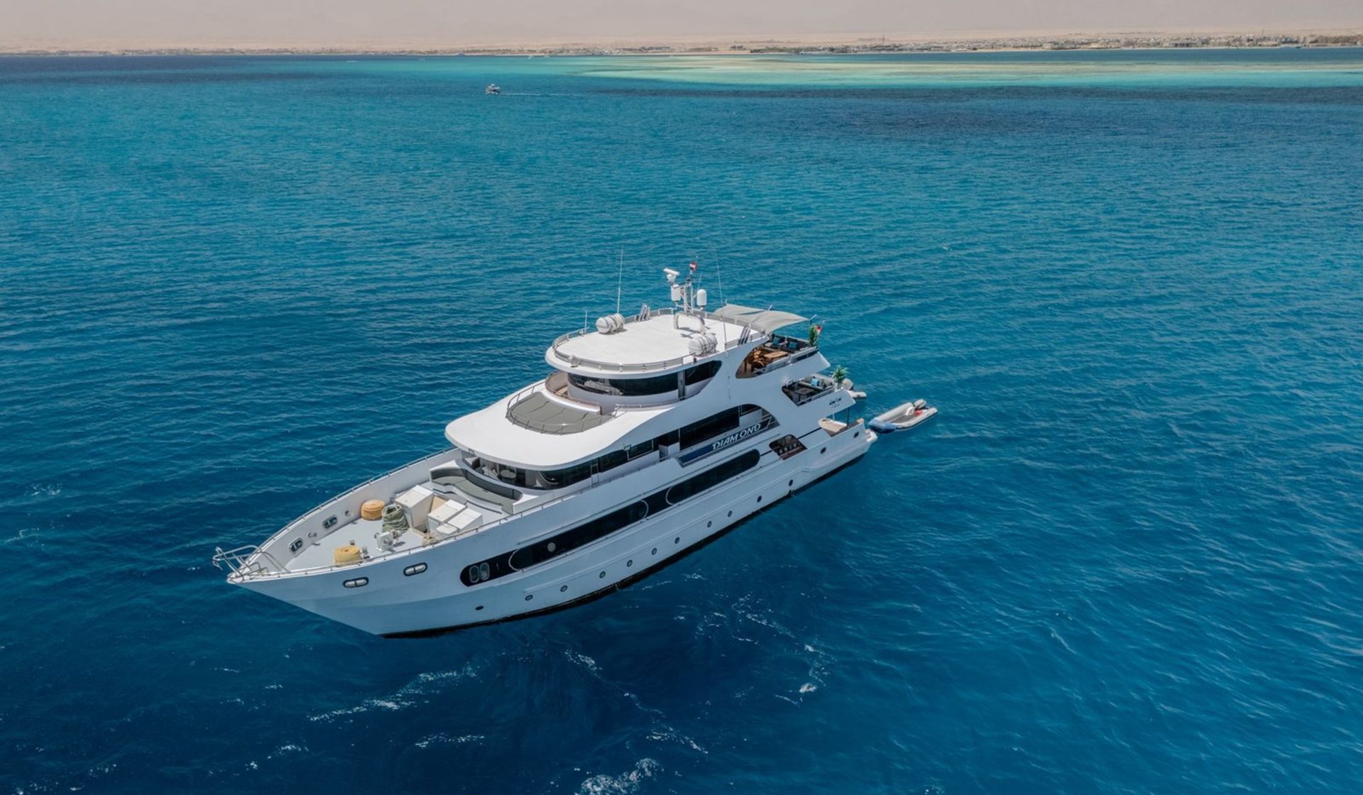 Aerial view of the Red Sea diving liveaboard in clear blue water
